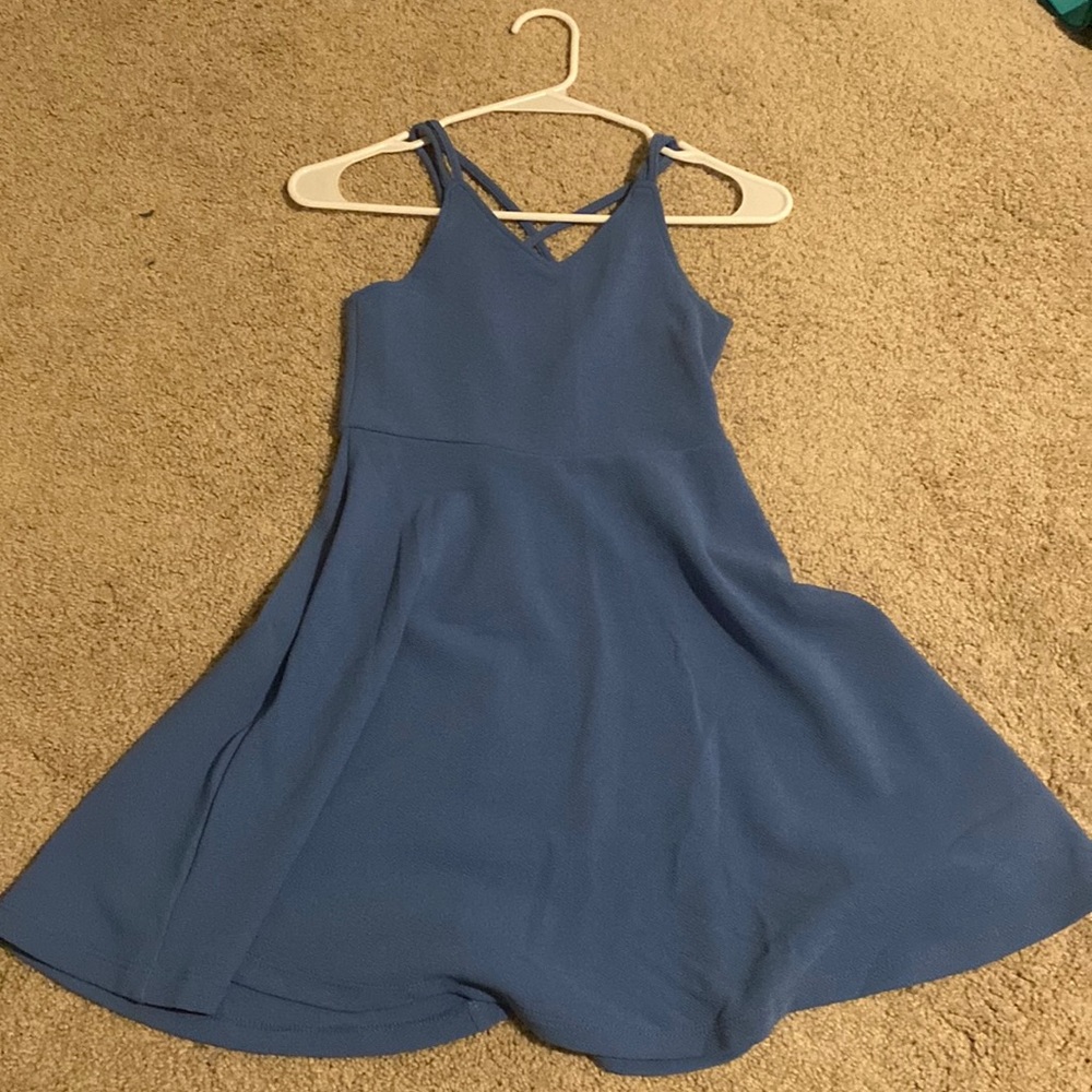It is a baby blue dress from Zunie.